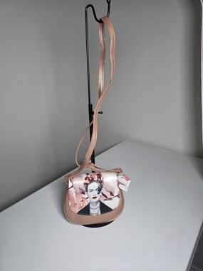 Rose Gold Crossbody Bag with Artistic Portrait Accent